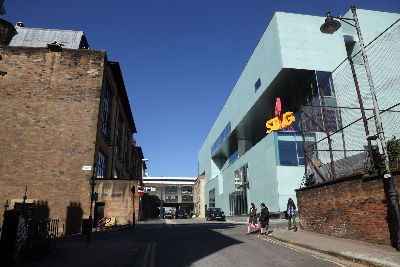 Now Sing, (2014), Michael Stumpf. Cast acrylic resin, painted steel, wooden base. Reid building balcony, The Glasgow School of Art.  From his exhibition, This Song Belongs to Those who Sing It, Mackintosh Museum, The Glasgow School of Art, Glasgow International Festival of Visual Art 2014. Photo: Janet Wilson.